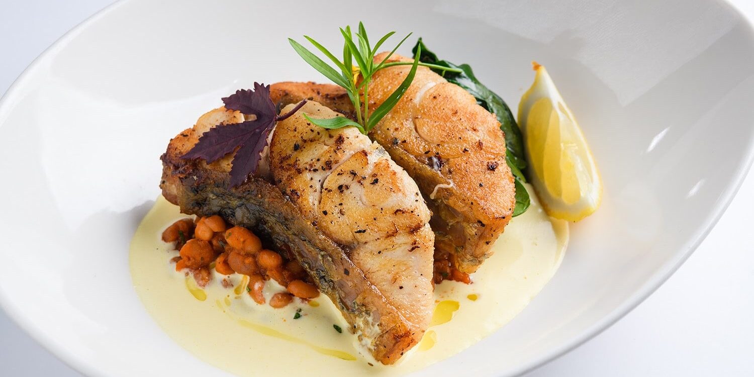 ifish-hk-pan-seared_barramundi_fillet_with_tomato_cannellini_bean_ragout_and_wilt…-min